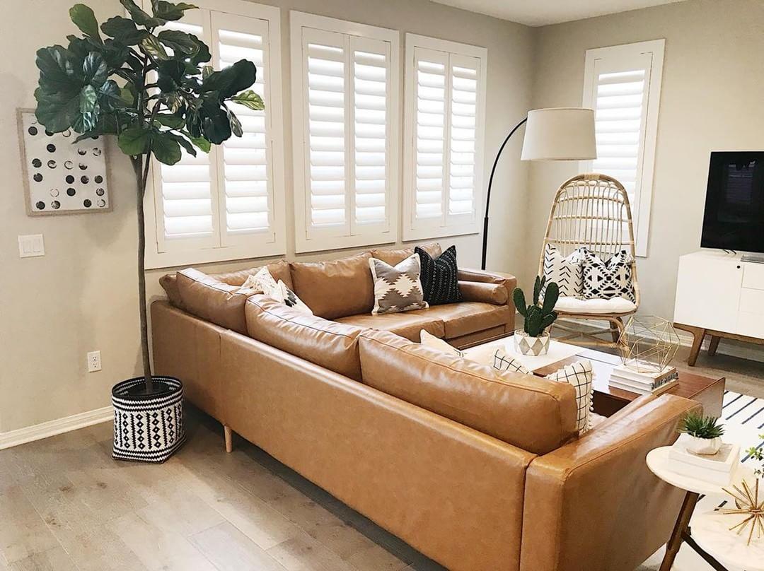 Cozy living room with Polywood shutters in Detroit.